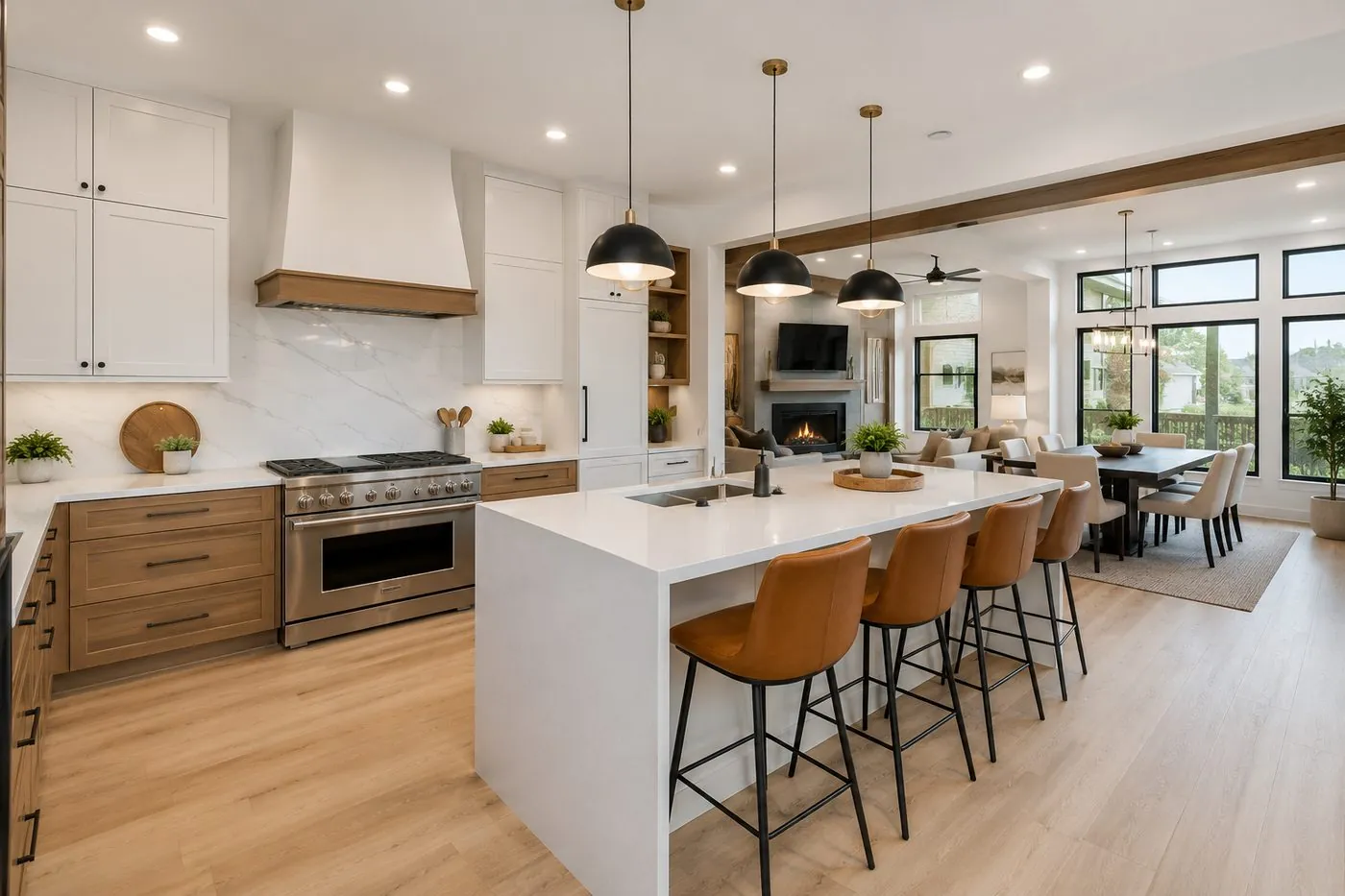 Open concept kitchen remodel connected to a bright living space